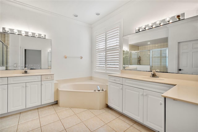 bathroom featuring tile patterned flooring, vanity, crown molding, and plus walk in shower