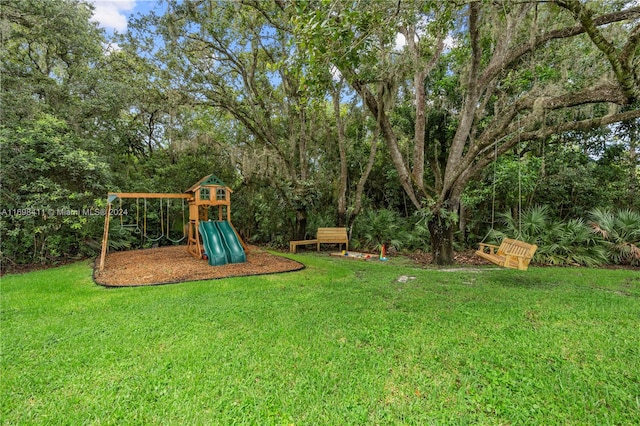 view of play area featuring a lawn