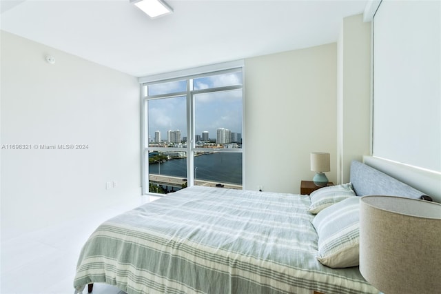 bedroom featuring expansive windows