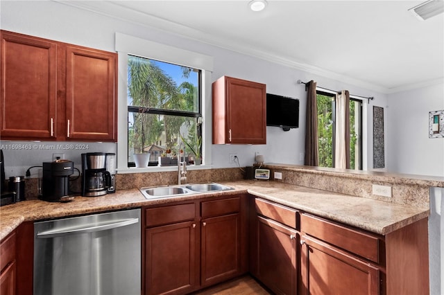 kitchen featuring kitchen peninsula, stainless steel dishwasher, crown molding, and sink