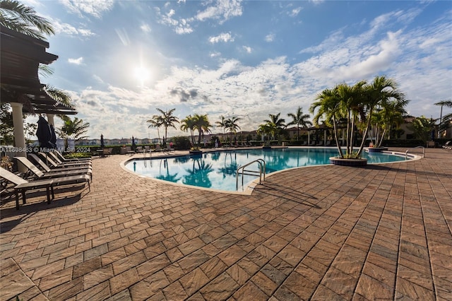 view of swimming pool featuring a patio