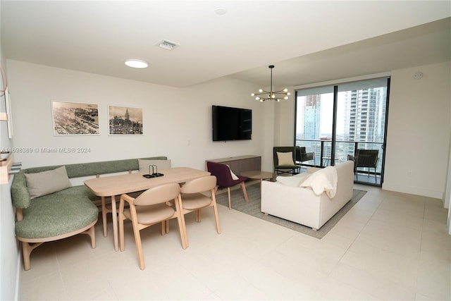 living room featuring a notable chandelier