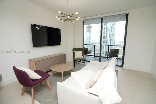 tiled living room featuring floor to ceiling windows and a chandelier