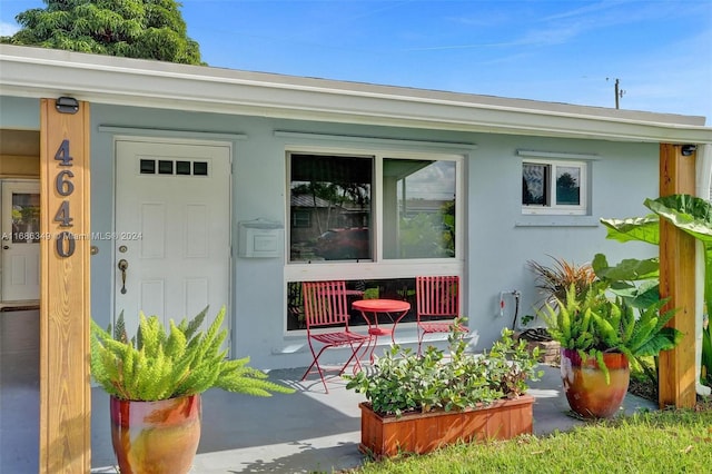 property entrance with a porch