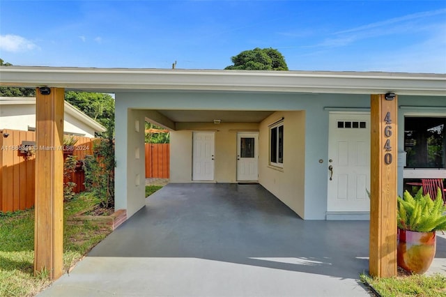 view of car parking featuring a carport