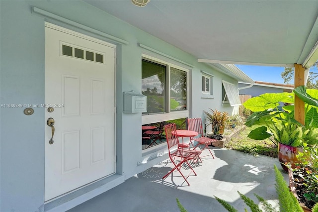 entrance to property with a porch