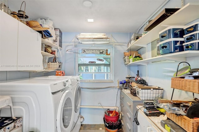 laundry room with cabinets and independent washer and dryer