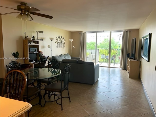 dining room featuring ceiling fan and light tile patterned flooring