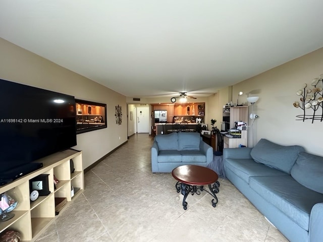 living room with ceiling fan