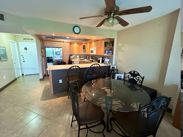 dining area featuring ceiling fan