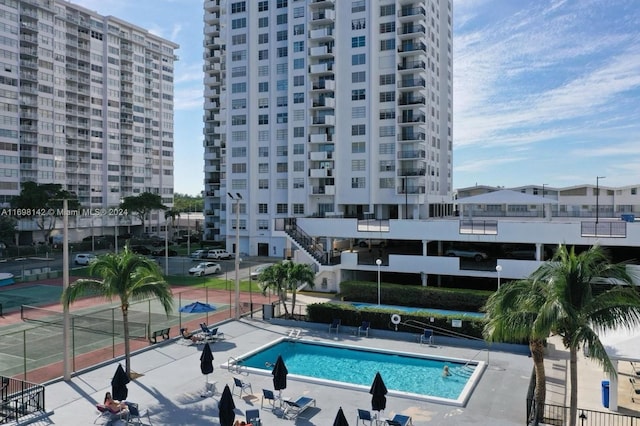 view of pool featuring a patio area