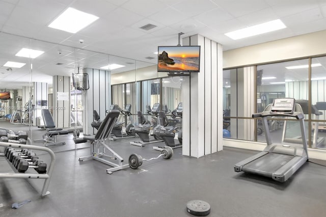 workout area with a drop ceiling