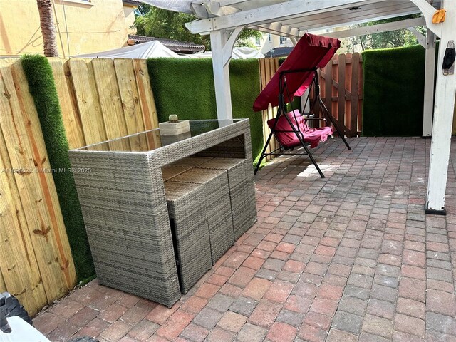 view of patio with a pergola