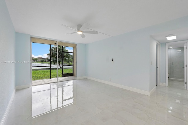 unfurnished room featuring ceiling fan