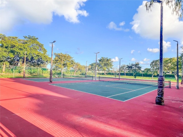 view of tennis court with basketball court