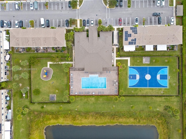 birds eye view of property featuring a water view