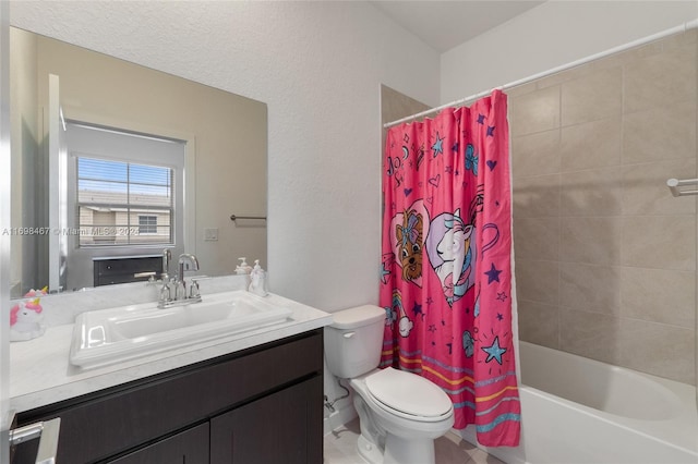 full bathroom with vanity, shower / bath combo, and toilet