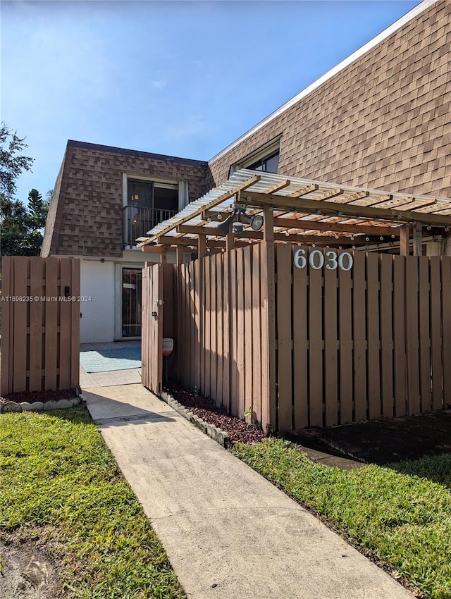 exterior space featuring a pergola