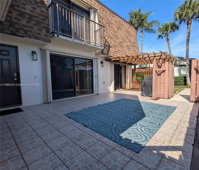 exterior space featuring a pergola and a patio area