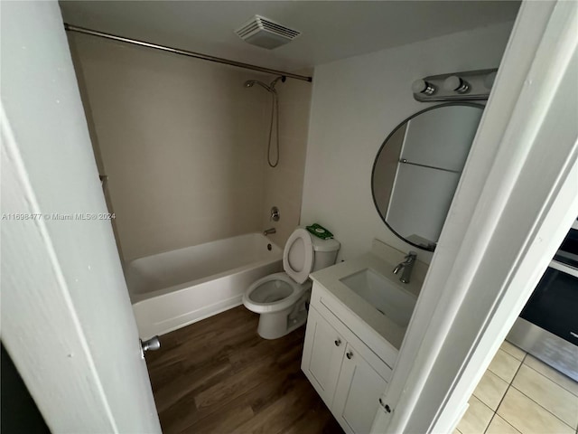 7135 NW 179th St Unit 209, Hialeah, FL 33015 - full bathroom featuring shower / washtub combination, vanity, and wood finished floors