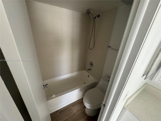 7135 NW 179th St Unit 209, Hialeah, FL 33015 - bathroom featuring shower / washtub combination and wood finished floors