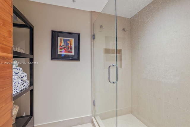 bathroom featuring an enclosed shower