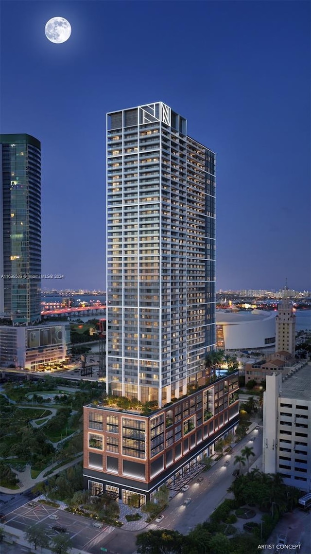 view of outdoor building at dusk