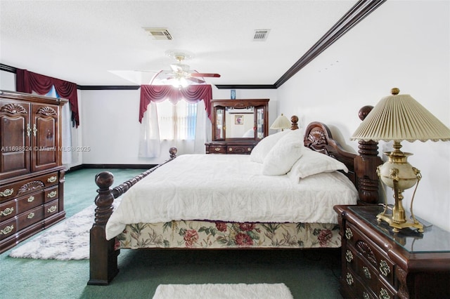 carpeted bedroom with ceiling fan and ornamental molding