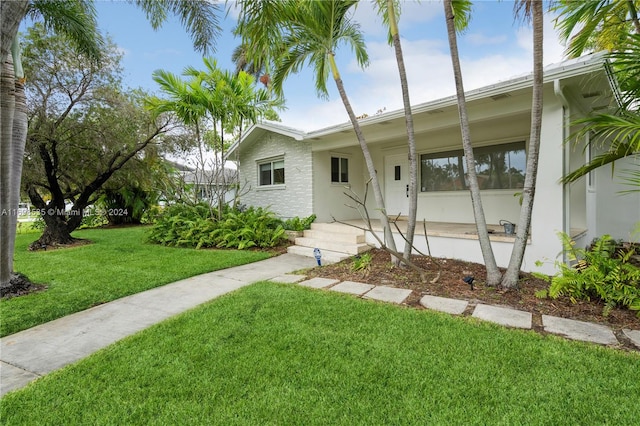 view of front of property with a front yard