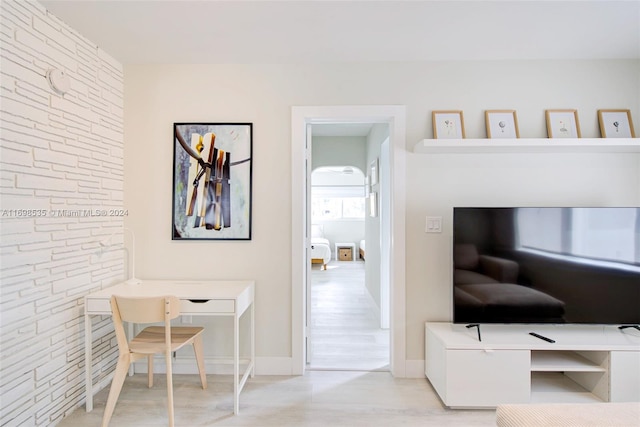 home office featuring light hardwood / wood-style flooring