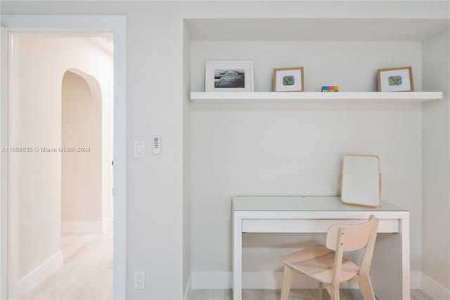 home office featuring light hardwood / wood-style floors