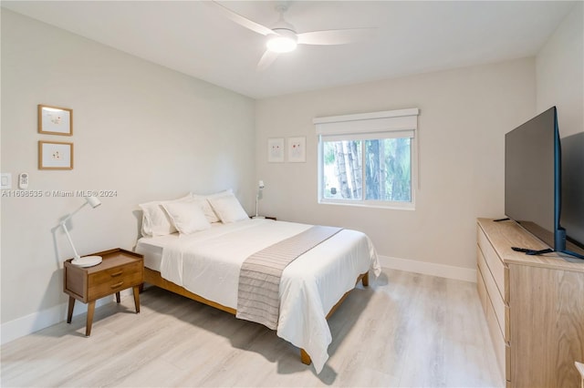 bedroom featuring ceiling fan and light wood-type flooring