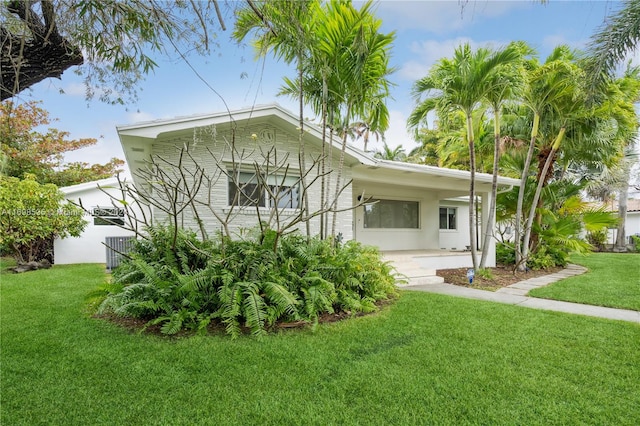 exterior space with a front yard