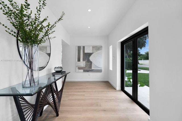 hallway featuring light hardwood / wood-style floors