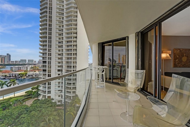 balcony featuring a water view