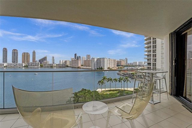 balcony featuring a water view