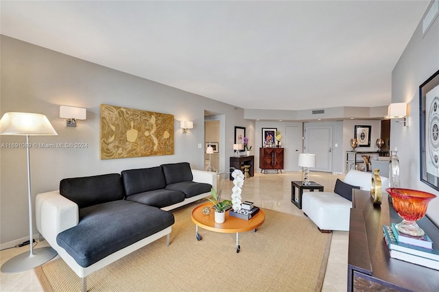 living room featuring light tile patterned flooring