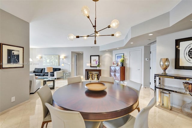 dining space with a chandelier