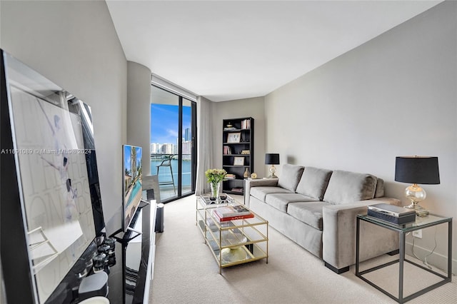 living room with carpet flooring and expansive windows