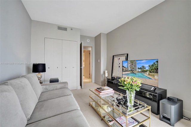 living room with light carpet