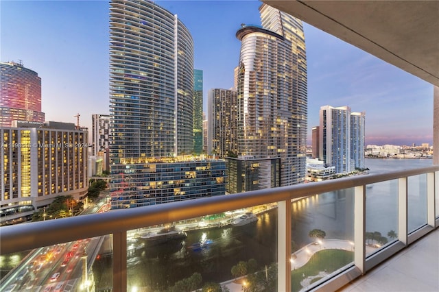 view of balcony at dusk