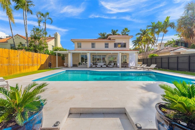 view of swimming pool with a patio