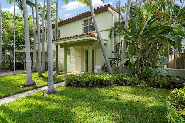 exterior space featuring a front lawn