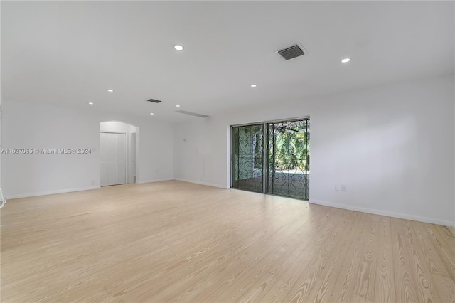 unfurnished room featuring light wood-type flooring