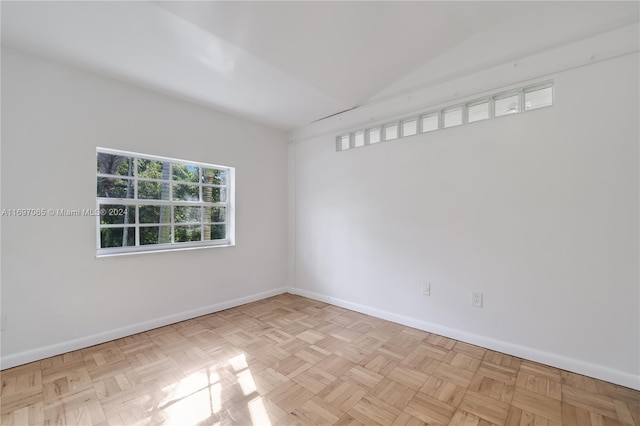 spare room featuring light parquet flooring