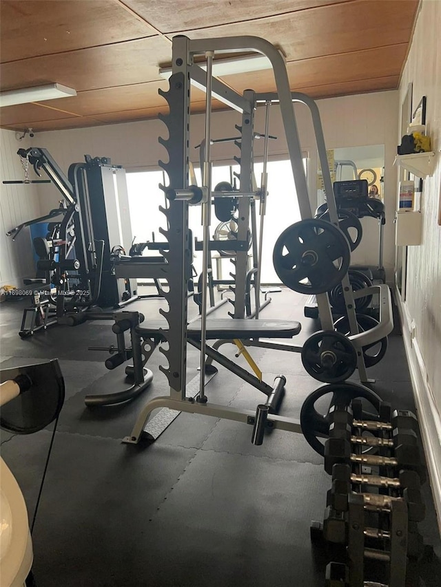 exercise room featuring wooden ceiling