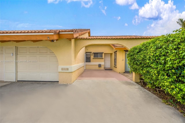 view of front of house with a garage