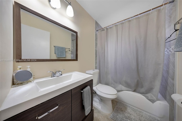 full bathroom featuring vanity, toilet, and shower / tub combo with curtain