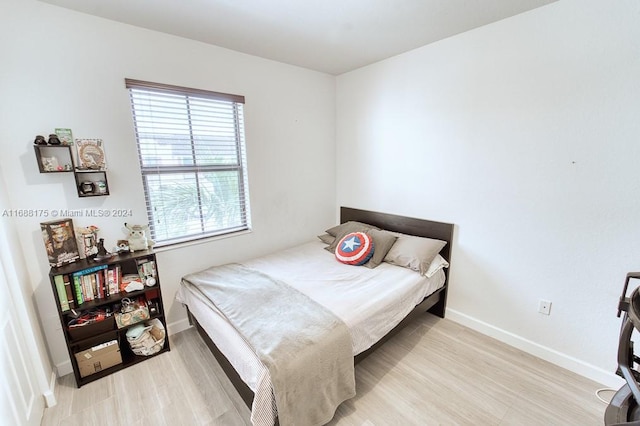 bedroom with light hardwood / wood-style flooring