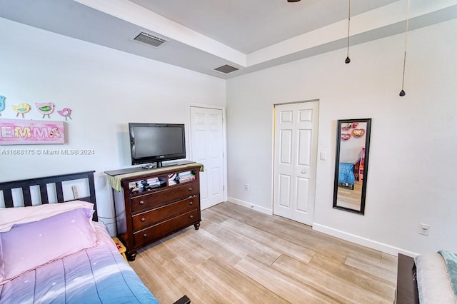 bedroom with light wood-type flooring